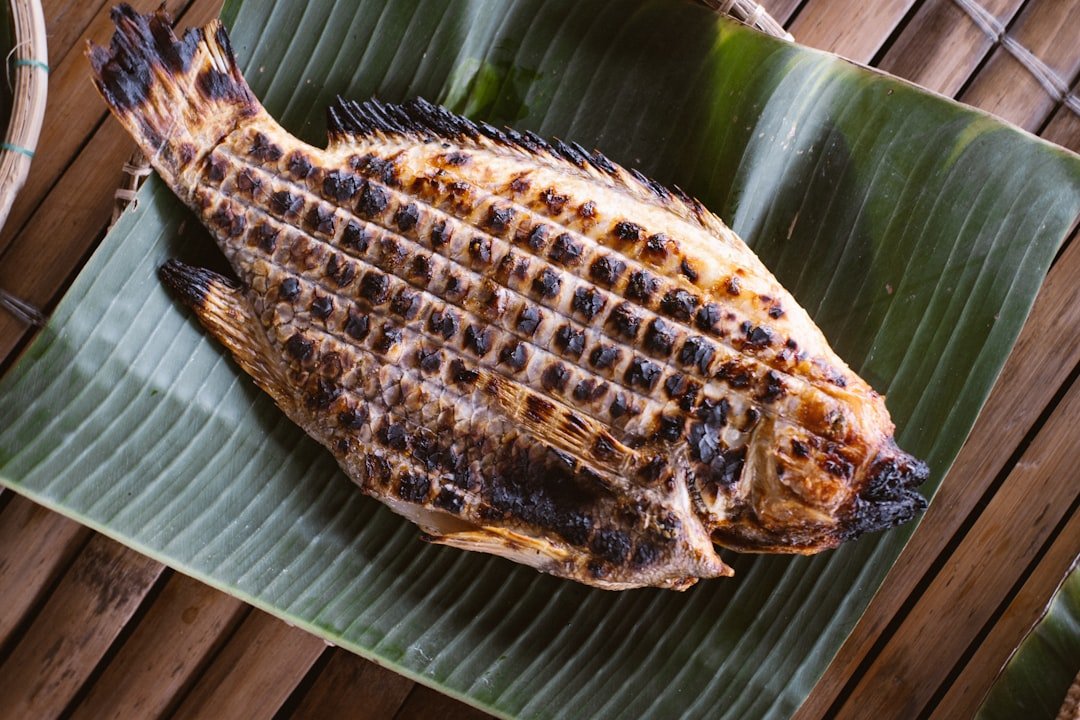 grilled fish on banana leaf diani beach kenyan coastal cuisine
