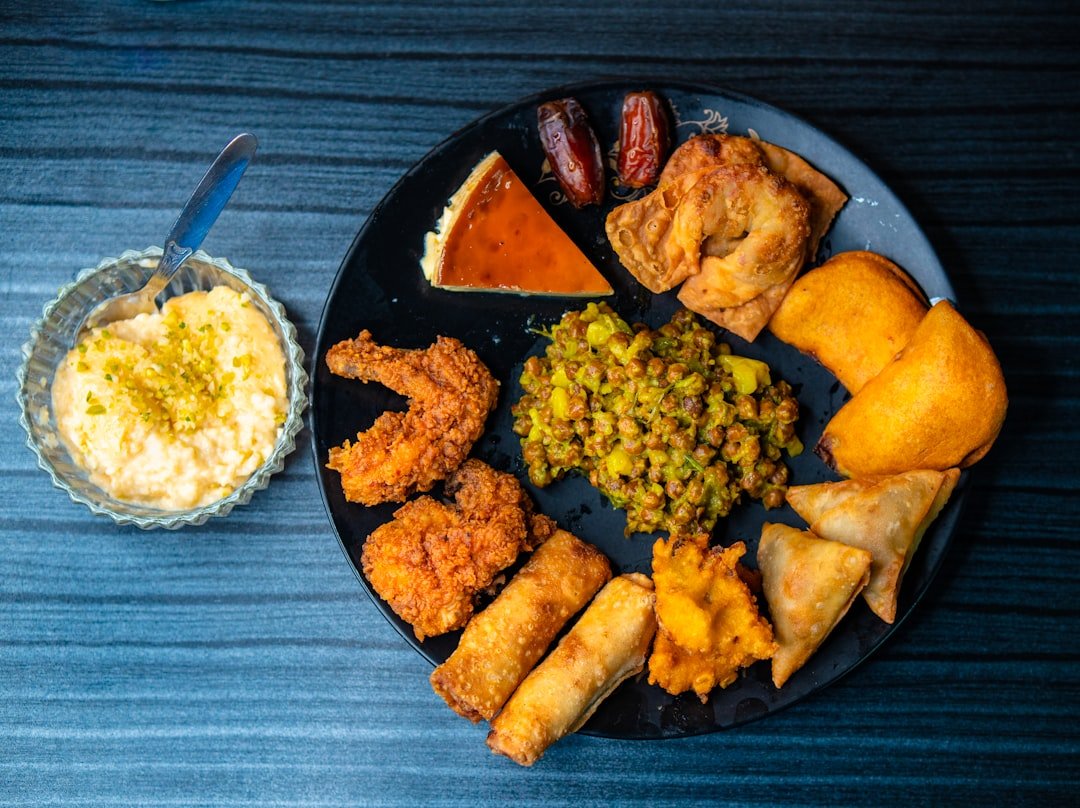 platter of Kenyan iftar foods including samosas and fried snacks for Ramadan