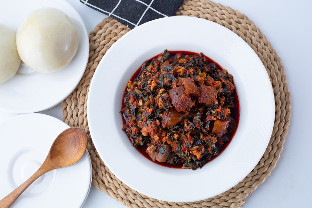 Kenyan matoke stew served in a bowl with fresh coriander garnish