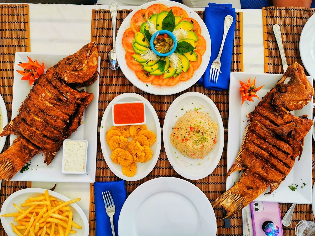 grilled fish and rice served at a kenyan roadside restaurant in the rift valley region near nakuru