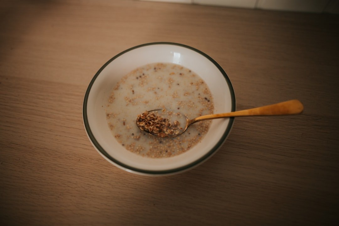 kenyan uji porridge in a bowl - step by step uji recipe from millet or sorghum flour