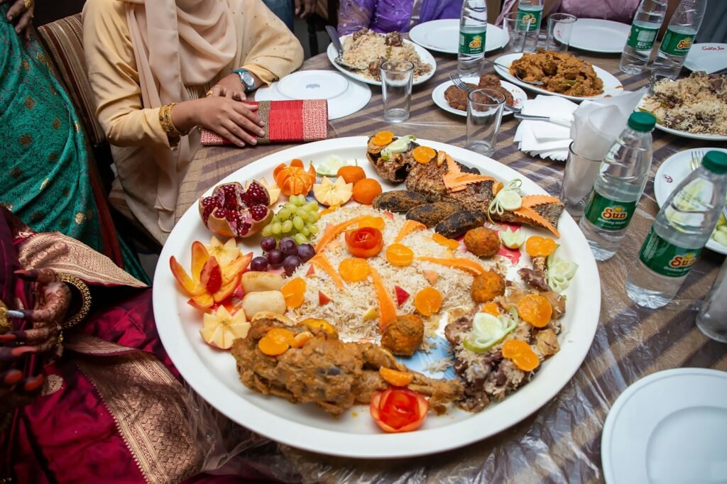 Kenyan Eid al-Adha feast table set with rice, meat and side dishes